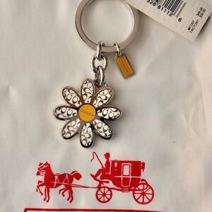 NWT Coach Yellow enamel daisy flower keychain fob